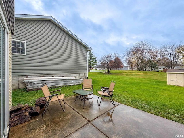 view of patio featuring a storage unit