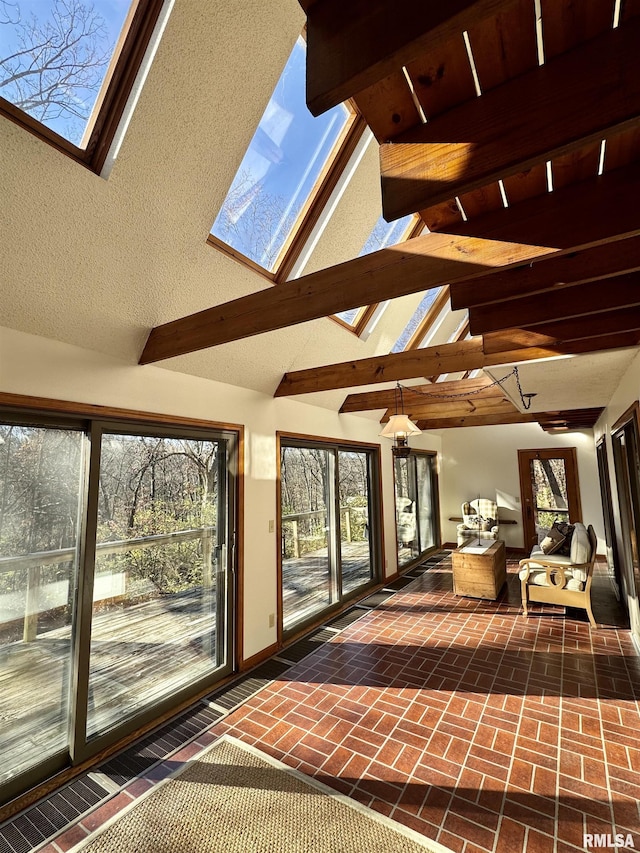 10110 E 850th St, Colchester, IL 62326 - unfurnished sunroom with a skylight and beam ceiling