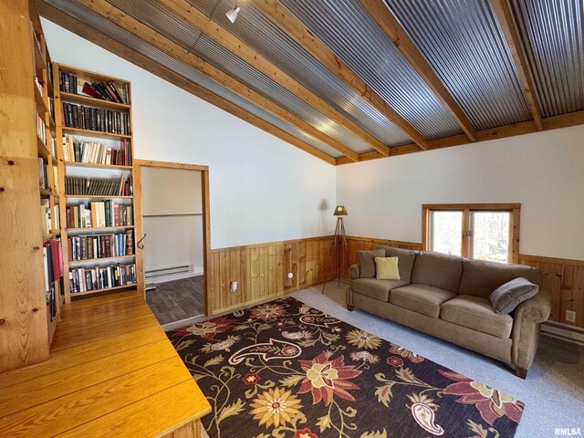 10110 E 850th St, Colchester, IL 62326 - living room featuring wainscoting, a baseboard radiator, and wooden walls