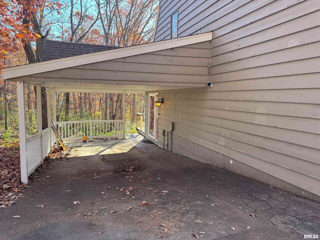 view of car parking with an attached carport