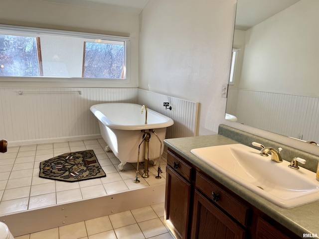 10110 E 850th St, Colchester, IL 62326 - full bath with wainscoting, a freestanding bath, vanity, and tile patterned flooring