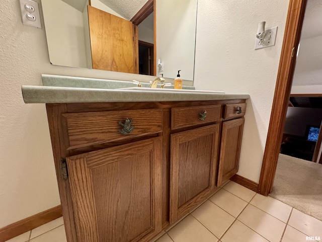 10110 E 850th St, Colchester, IL 62326 - bathroom with tile patterned flooring, vanity, and baseboards