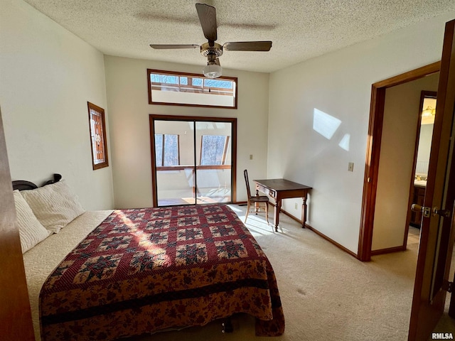 bedroom with a textured ceiling, baseboards, a ceiling fan, and light colored carpet