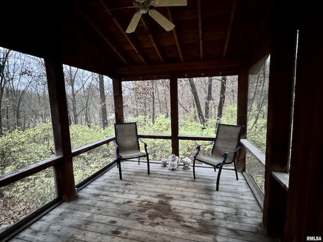 10110 E 850th St, Colchester, IL 62326 - sunroom / solarium featuring a ceiling fan, lofted ceiling, a wooded view, and plenty of natural light