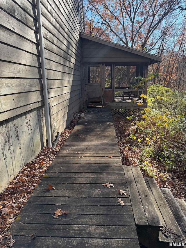 deck with a sunroom