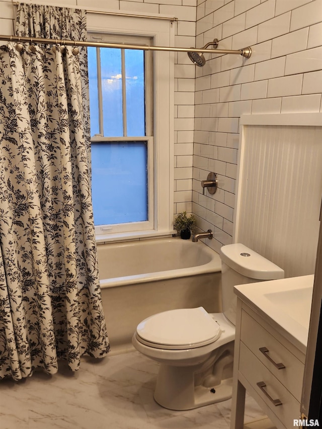 full bathroom with shower / tub combo with curtain, vanity, and toilet