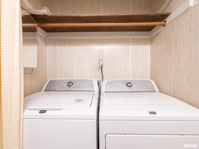 washroom with separate washer and dryer