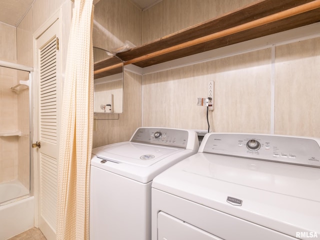 laundry area featuring independent washer and dryer