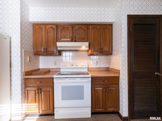 kitchen with decorative backsplash, a textured ceiling, and white range with electric stovetop