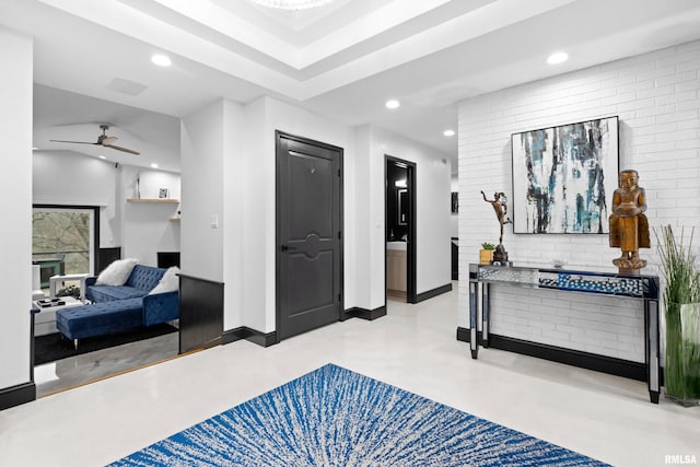 bedroom featuring brick wall, baseboards, and recessed lighting