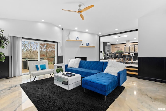 living area featuring marble finish floor, ceiling fan, vaulted ceiling, and recessed lighting