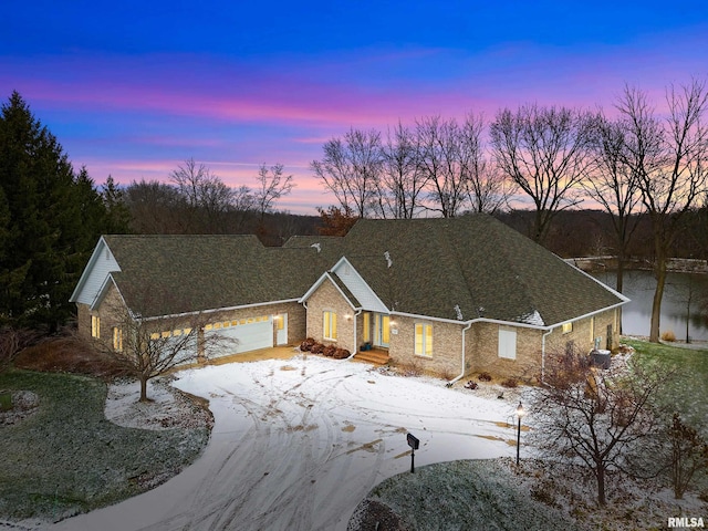 view of front of home with a garage