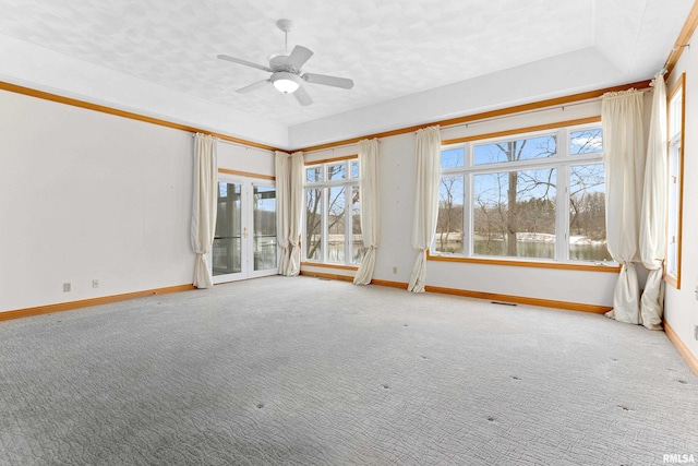 interior space featuring french doors, ceiling fan, and a healthy amount of sunlight