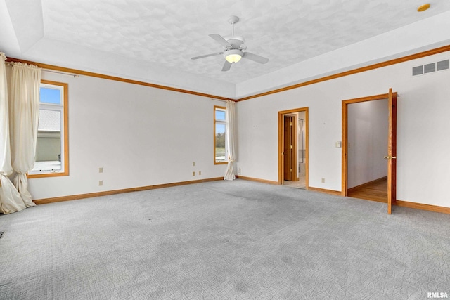 unfurnished room featuring a textured ceiling, carpet floors, and ceiling fan