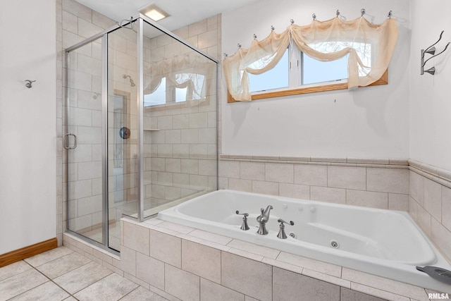 bathroom featuring shower with separate bathtub and tile patterned floors