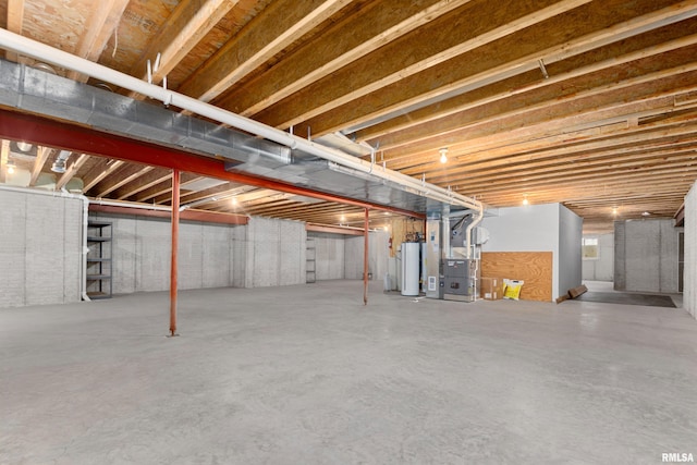 basement with heating unit and water heater