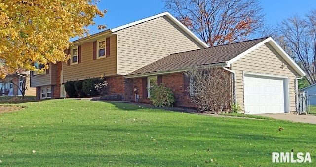 exterior space featuring a yard and a garage