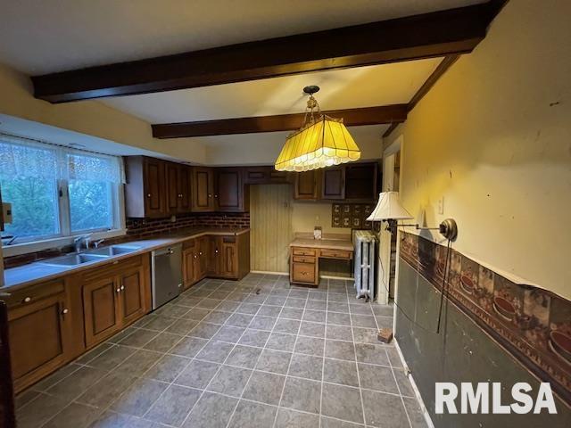 704 S Lafayette St, Macomb, IL 61455 - kitchen featuring stainless steel dishwasher, beamed ceiling, radiator, a sink, and decorative backsplash