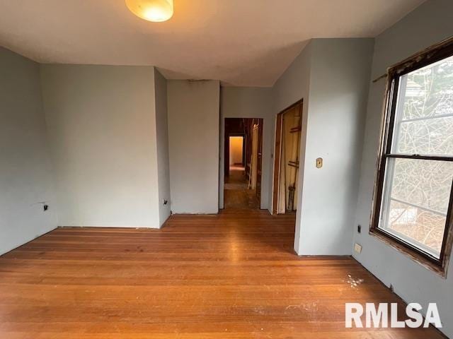 704 S Lafayette St, Macomb, IL 61455 - spare room featuring light wood-type flooring and healthy amount of natural light