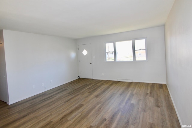 entrance foyer with dark hardwood / wood-style flooring