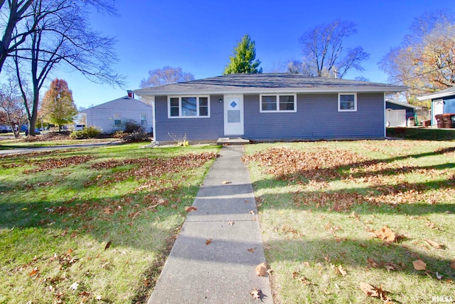 view of front of home with a front lawn