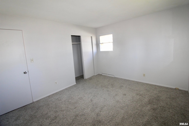 unfurnished bedroom with carpet floors