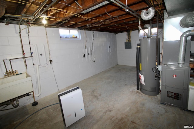 basement featuring heating unit and gas water heater