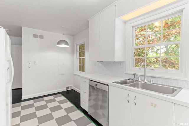 kitchen featuring dishwasher, white fridge with ice dispenser, white cabinetry, and hanging light fixtures