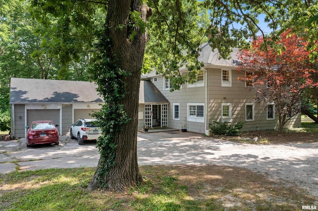 colonial house featuring a garage