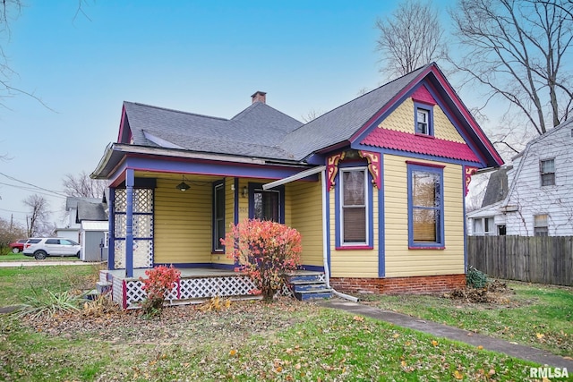 victorian-style house with a porch