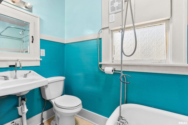 bathroom with toilet and sink