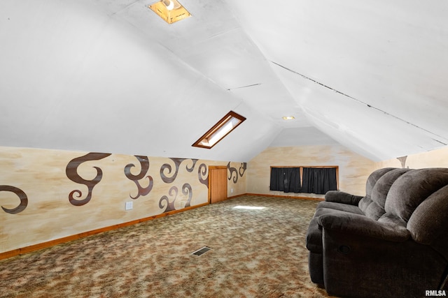 bonus room with carpet floors and vaulted ceiling with skylight