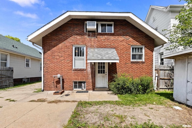 rear view of property featuring a patio area