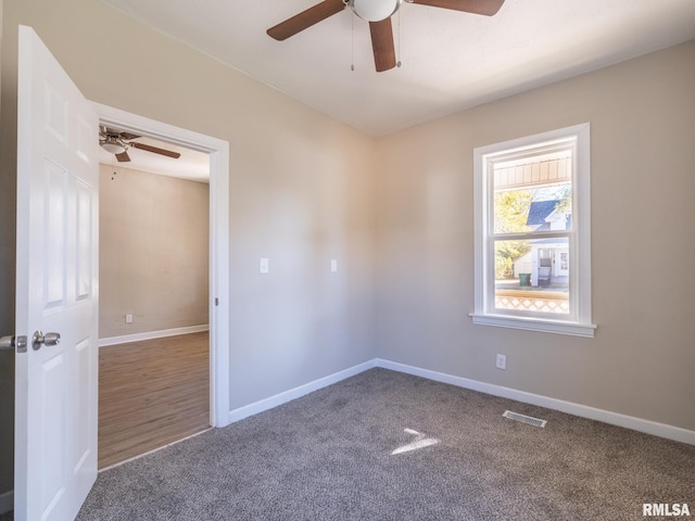 empty room with carpet flooring