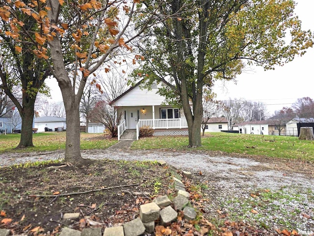 bungalow featuring covered porch