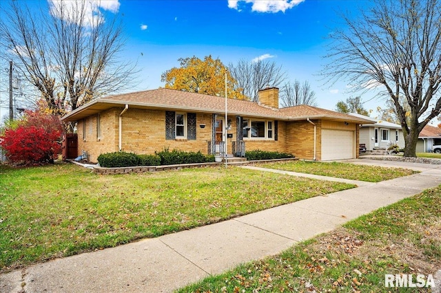 ranch-style home featuring a front lawn and a garage