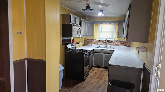 kitchen featuring gray cabinets, sink, wood-type flooring, and black range with gas cooktop