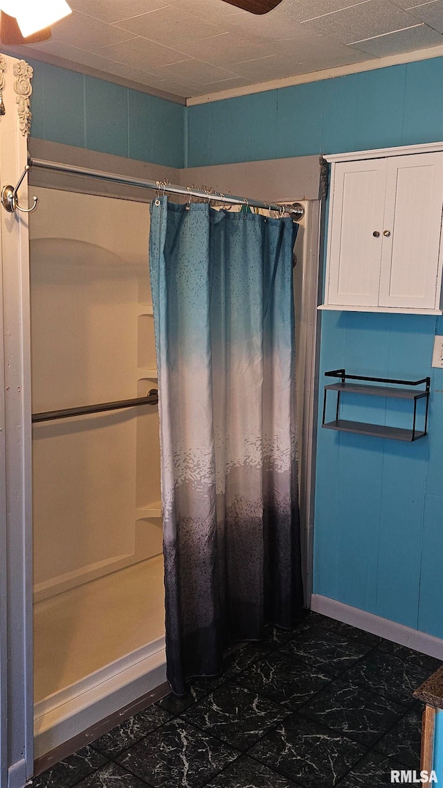 bathroom with a shower with curtain