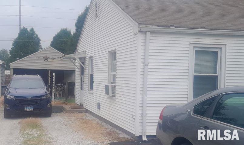 view of home's exterior featuring cooling unit