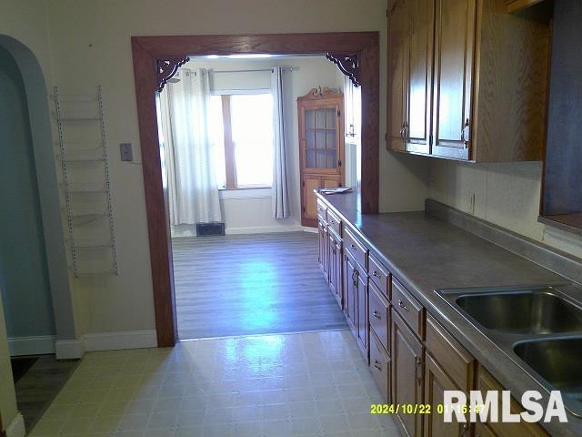 kitchen featuring sink and light hardwood / wood-style flooring