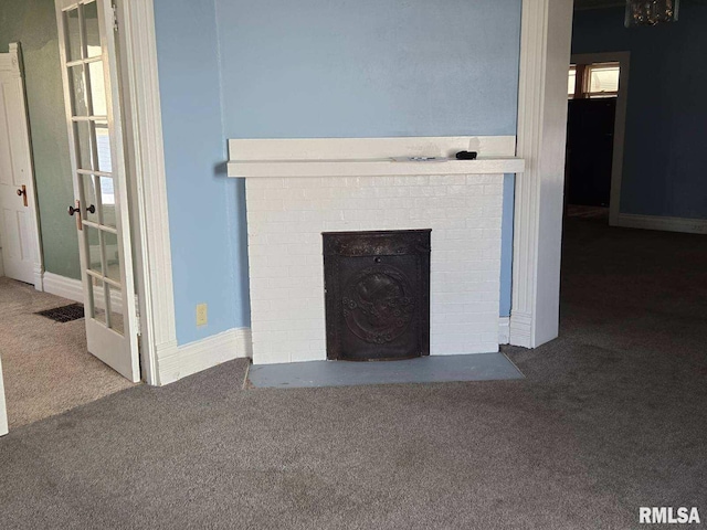 details with carpet floors and a fireplace