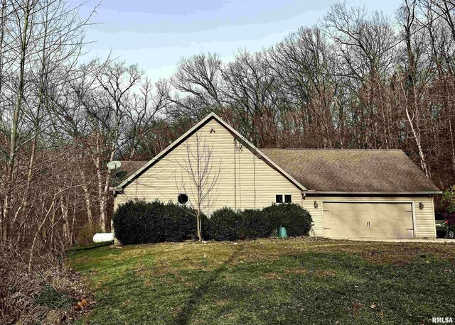 view of side of property with cooling unit, covered porch, and a yard