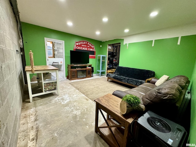 living room featuring concrete floors