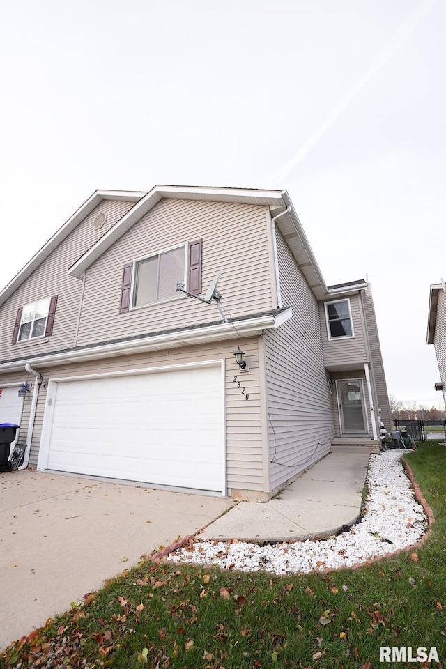 front of property featuring a garage