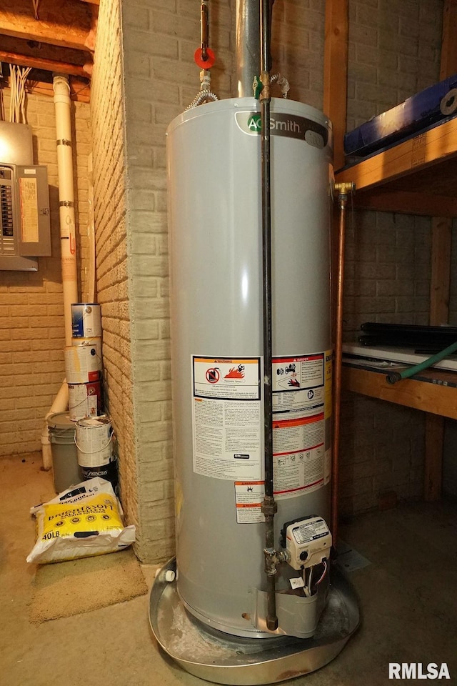 utility room with gas water heater