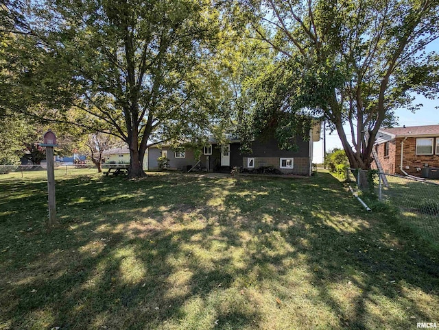 view of yard with fence