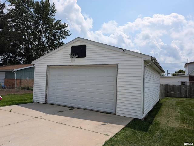 garage with a yard