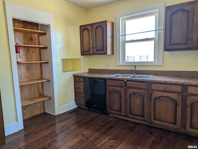 kitchen with dark hardwood / wood-style flooring, black dishwasher, dark brown cabinetry, and sink