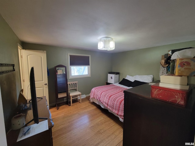 bedroom featuring light hardwood / wood-style flooring