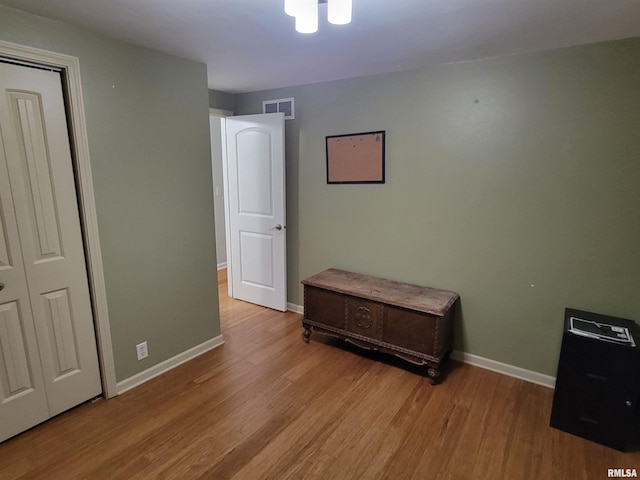 bedroom featuring light wood-type flooring